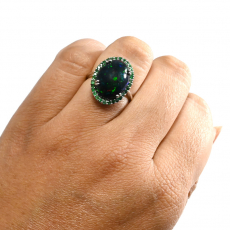 Ethiopian Black Opal Cab Oval 5.82 Carat Ring in 14K White Gold with Emerald Accents