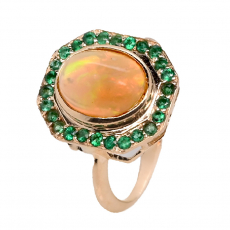 Ethiopian Opal Cab Oval 1.68 Carat Ring in 14K Yellow Gold with Emerald Accents