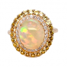 Ethiopian Opal Cab Oval 3.06 Carat Ring in 14K Yellow Gold with Diamond and yellow Sapphire Accents