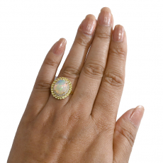 Ethiopian Opal Cab Oval 3.06 Carat Ring in 14K Yellow Gold with Diamond and yellow Sapphire Accents