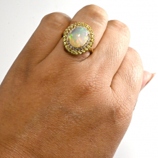 Ethiopian Opal Cab Oval 3.06 Carat Ring in 14K Yellow Gold with Diamond and yellow Sapphire Accents