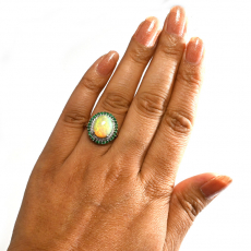 Ethiopian Opal Cab Oval 3.77 Carat Ring in 14K White Gold with Diamond and Emerald Accents