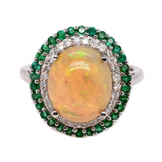 Ethiopian Opal Cab Oval 3.77 Carat Ring in 14K White Gold with Diamond and Emerald Accents