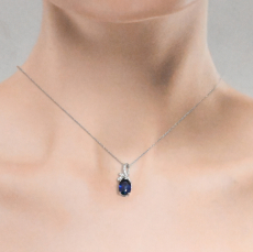 Nigerian Blue Sapphire Oval 1.63 Carat Pendant In 14K White Gold With Accented Diamonds (Chain Not Included).