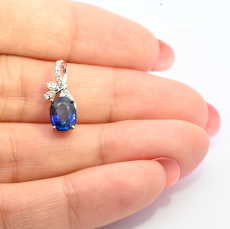 Nigerian Blue Sapphire Oval 1.63 Carat Pendant In 14K White Gold With Accented Diamonds (Chain Not Included).