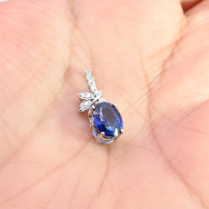 Nigerian Blue Sapphire Oval 1.63 Carat Pendant In 14K White Gold With Accented Diamonds (Chain Not Included).