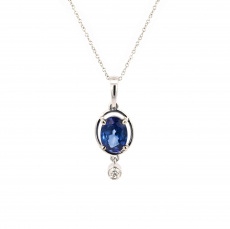 Nigerian Blue Sapphire Oval 1.63 Carat Pendant In 14K White Gold With Accented Diamonds (Chain Not Included).