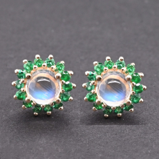 Rainbow Moonstone Round Cab 1.10 Carat Stud Earrings in 14K Yellow Gold with Emerald Accents