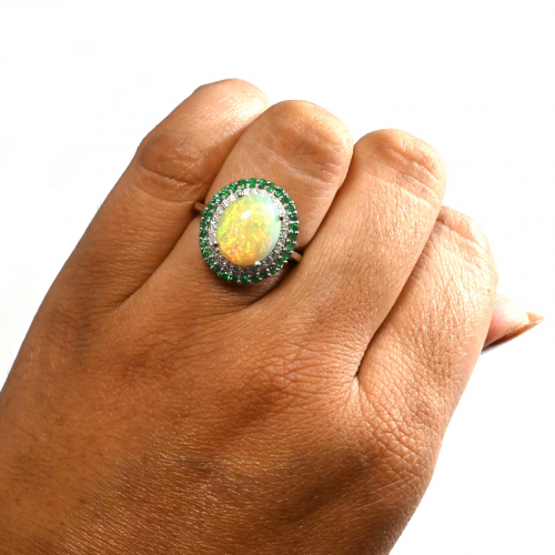 Ethiopian Opal Cab Oval 3.77 Carat Ring in 14K White Gold with Diamond and Emerald Accents